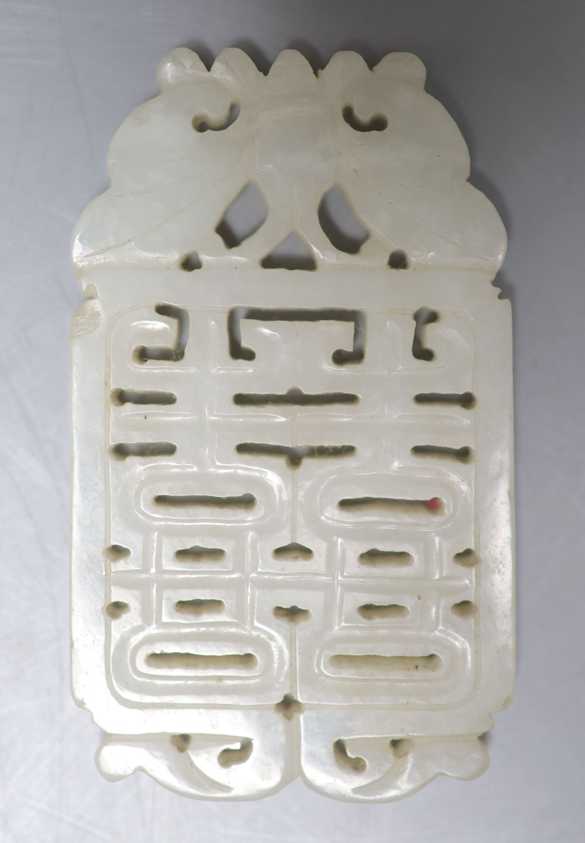 A 19th century Chinese pale celadon jade Shuangxi pendant plaque , length 7cm